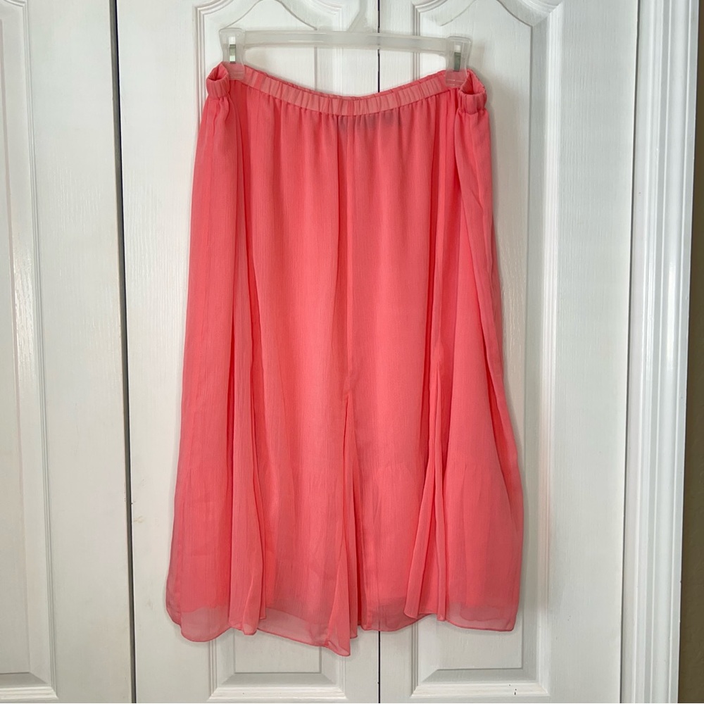 New York City design company, woman, long coral skirt size 2X
